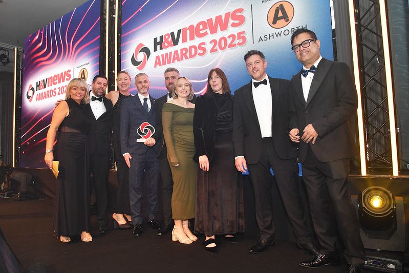 IMS Team collecting Heat Pump Project of the Year award